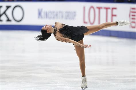 Ziegler surges from fifth to first with a near-flawless free skate to win the NHK Trophy